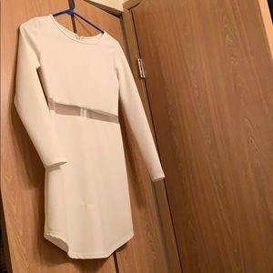 Long sleeve white mini dress with shear cutout